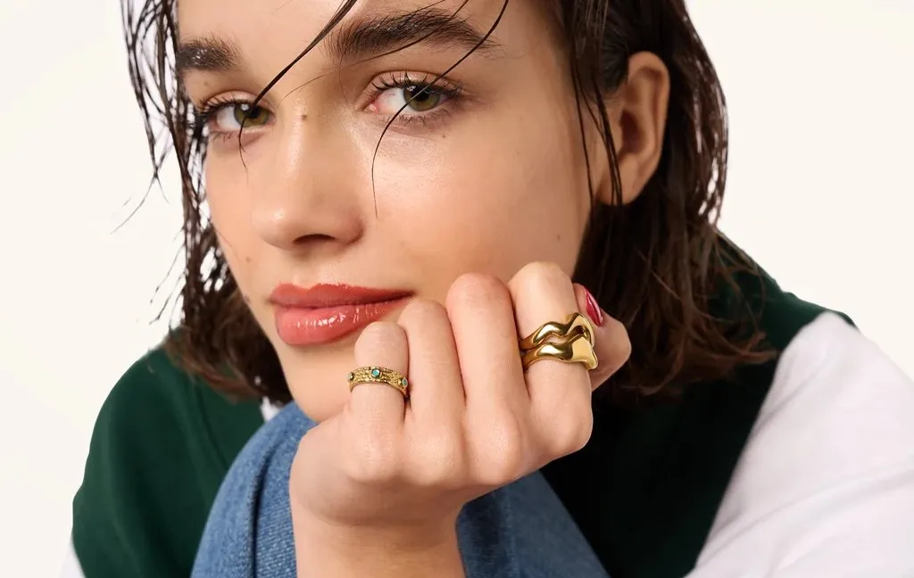 Close-up portrait of a woman wearing Hey Harper jewelry